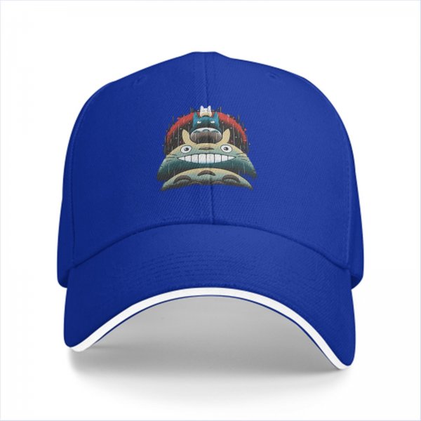 Black baseball cap with stacked Totoro characters in rainy scene