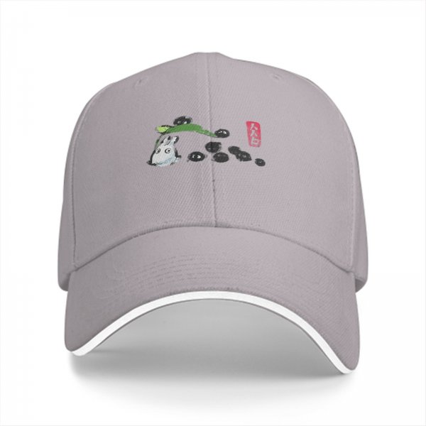 Black baseball cap with small forest spirit and soot sprite graphic