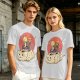 Olive T-shirt with a cat warrior riding a flying cloud graphic