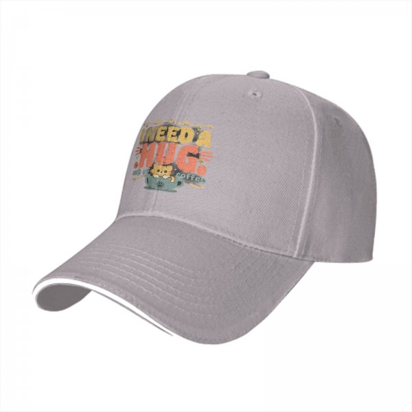 Black baseball cap with 'I need a huge cup of coffee' and cat graphic