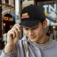 Black baseball cap with sleeping duck graphic and 'Until My Problems Disappear' text