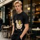 Olive T-Shirt Featuring Frog Riding Duck Holding Knife