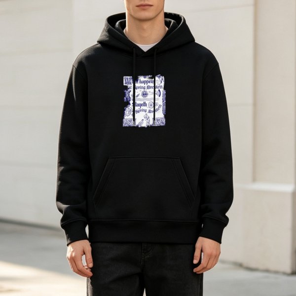 Black hoodie with vintage-style decorative text and graphic print