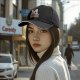 Black baseball cap with corgi dog and 'I'll Be Watching You' snack quote