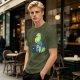 Olive t-shirt with a cartoon dinosaur working on laptop holding coffee