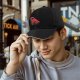 Black Baseball Cap With Playful Black Cat Red Thunder Cat Logo Print