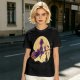 Olive t-shirt with witch flying on broom against full moon