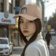 Black baseball cap with Totoro forest spirit graphic and Japanese text