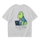Olive t-shirt with a cartoon dinosaur working on laptop holding coffee