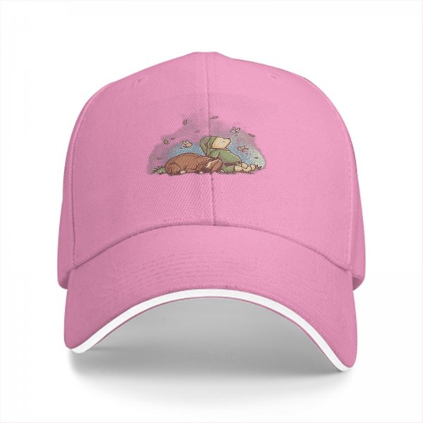 Black baseball cap with whimsical sleeping character and butterfly print