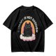 Olive graphic tee with black cat, rainbow, and 'Therapy Is Not Enough' text