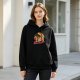 Black hoodie with retro sunset knight graphic and 'Praise the Sun' text