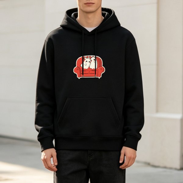 Black hoodie with cute ghosts sitting on red couch graphic