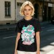 Olive t-shirt with a cartoon apple juice box skeleton graphic