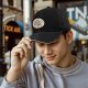 Black baseball cap with 'Support Our Parks Or Else' wildlife graphic