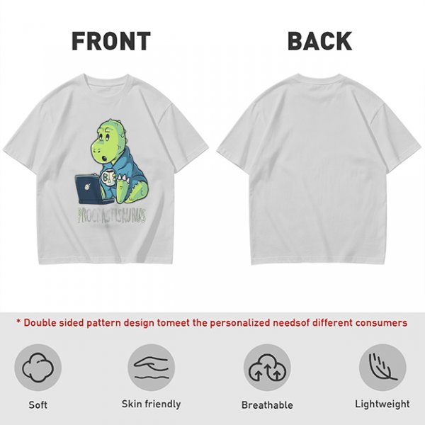 Olive t-shirt with a cartoon dinosaur working on laptop holding coffee