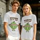 Olive green t-shirt with cartoon apple lifting dumbbells and 'Working on my core' text