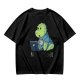 Olive t-shirt with a cartoon dinosaur working on laptop holding coffee