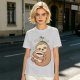 Olive green sloth t-shirt with 'Busy Doing' coffee graphic