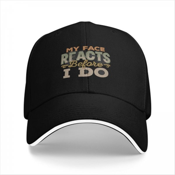 Black baseball cap with 'My Face Reacts Before I Do' printed design