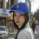 Black baseball cap with cute monster cat graphic print
