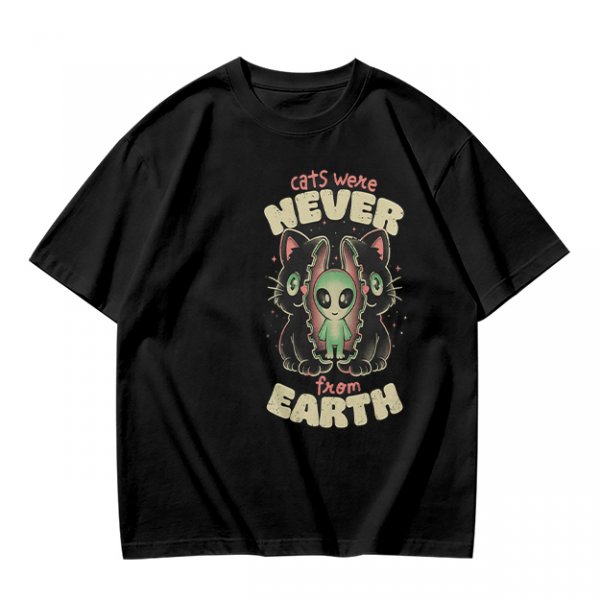 Olive green graphic t-shirt with 'cats were never from earth' alien and cat print