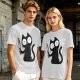 Olive T-shirt with a black cartoon cat holding a bloodied knife