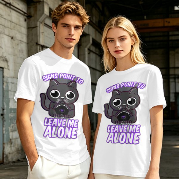 Olive t-shirt with a black cat holding a magic 8 ball and text 'Signs Point To Leave Me Alone'