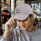 Black baseball cap with 'I Exist Without My Consent' grumpy cat print