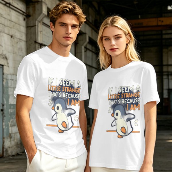 Olive t-shirt with 'If I seem a little strange that's because I am' penguin print