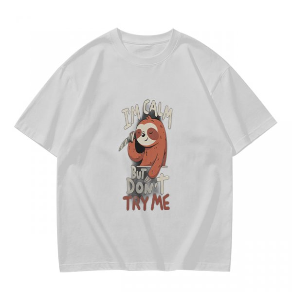 Olive graphic t-shirt with sloth holding knife and 'I'm calm but don't try me' text