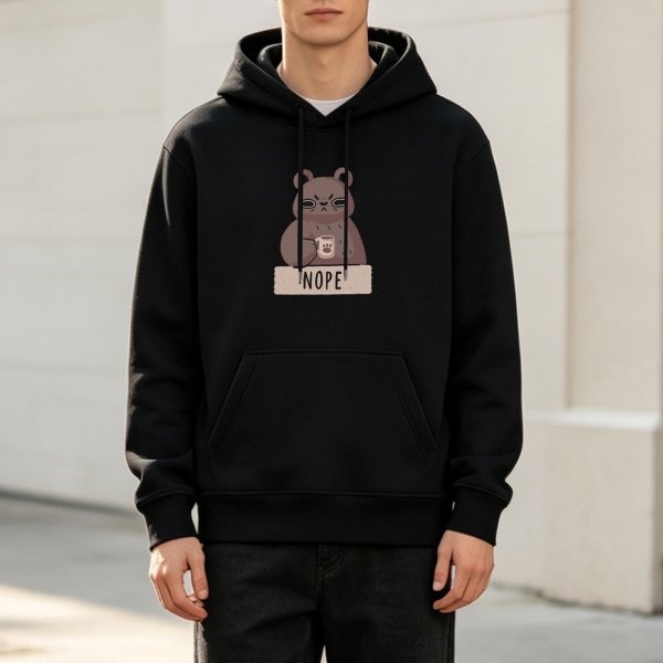 Black graphic hoodie with grumpy bear holding coffee and 'NOPE' text
