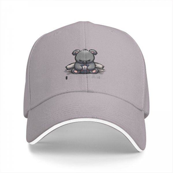 Black baseball cap with grumpy koala sitting on papers print
