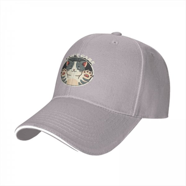 Black baseball cap with 'I DON'T CARE' and relaxed cat graphic