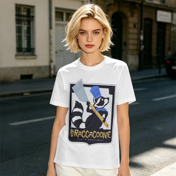 Olive green t-shirt with raccoon chef graphic and text