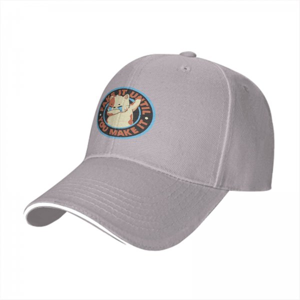 Black baseball cap with crying cat graphic and fake it until you make it text