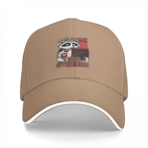 Black baseball cap with a tired raccoon office worker graphic
