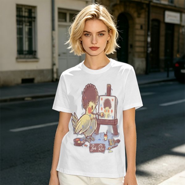 Olive T-Shirt Featuring a Bird Painting a Self-Portrait with an Afro