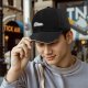 Black Baseball Cap With Chubby Lying Unicorn Rainbow Print