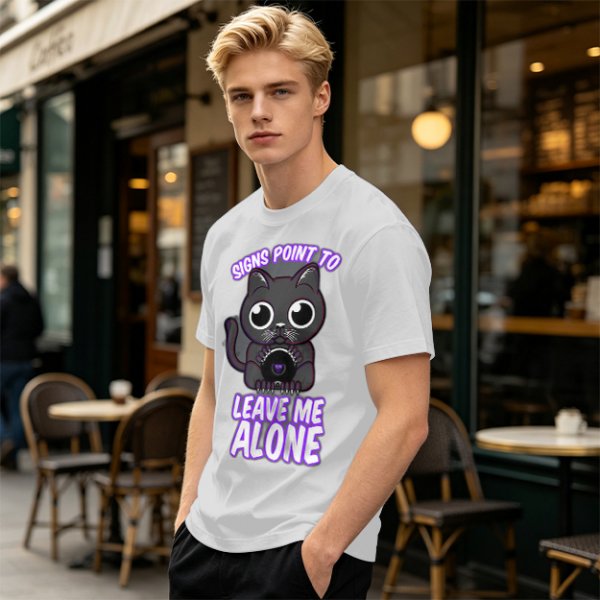 Olive t-shirt with a black cat holding a magic 8 ball and text 'Signs Point To Leave Me Alone'