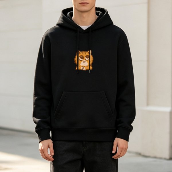 Black hoodie with cute wide-eyed orange cat graphic
