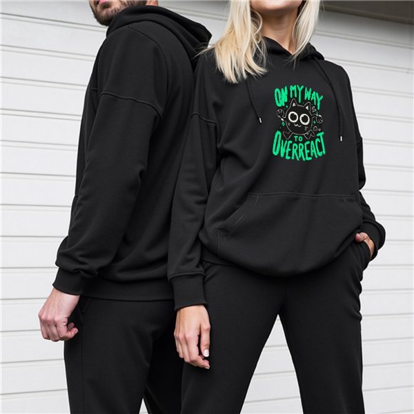Black hoodie with 'On My Way To Overreact' cat graphic