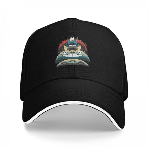 Black baseball cap with stacked Totoro characters in rainy scene