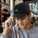 Black baseball cap with shark graphic and 'NO' text print