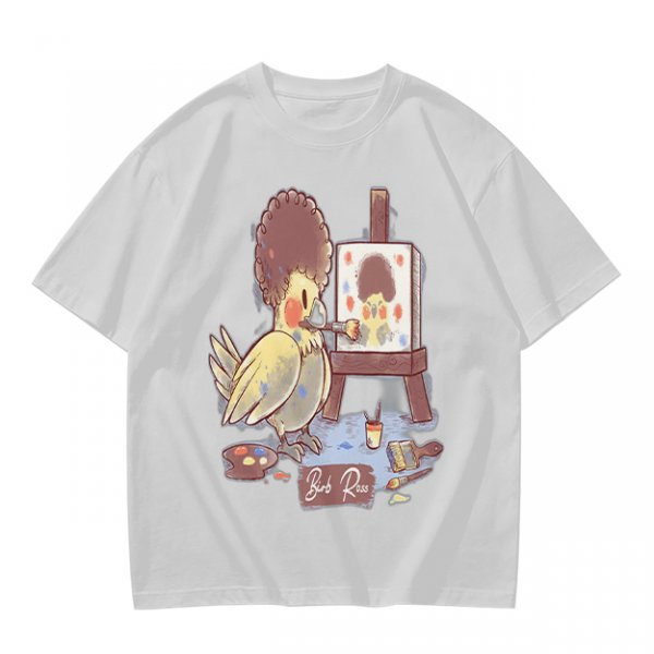 Olive T-Shirt Featuring a Bird Painting a Self-Portrait with an Afro