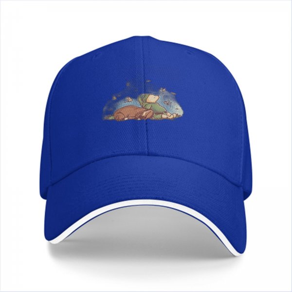 Black baseball cap with whimsical sleeping character and butterfly print