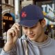 Black Baseball Cap With Red Anime Character Graphic Print