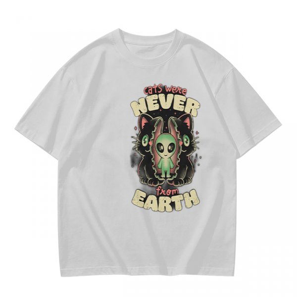 Olive green graphic t-shirt with 'cats were never from earth' alien and cat print