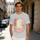Olive t-shirt with a cartoon dinosaur in a ramen bowl graphic