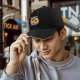 Black Baseball Cap with Anime Character Eating Ramen Graphic